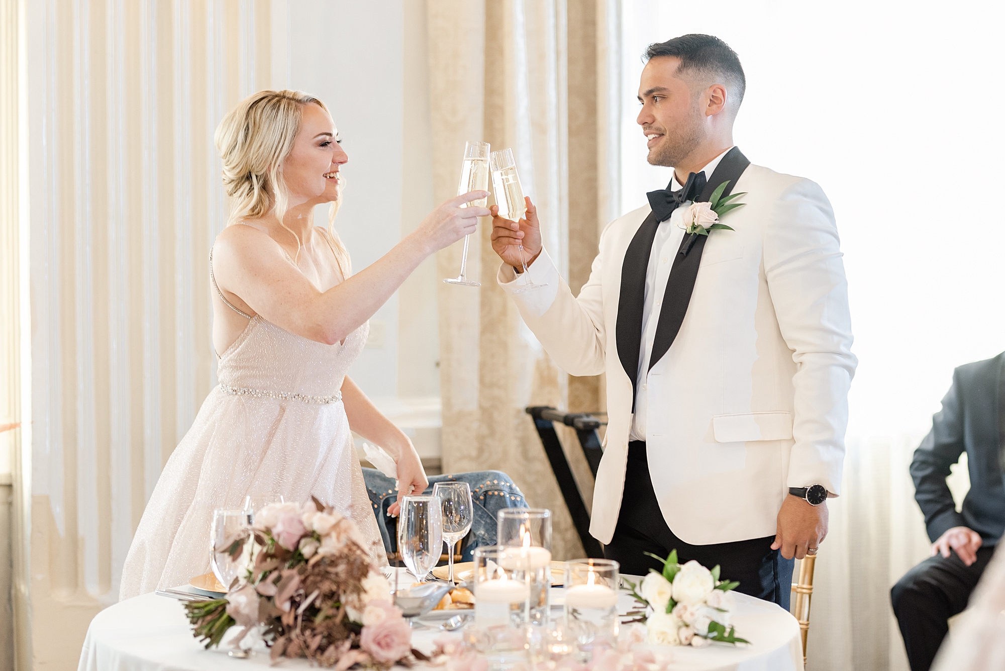 bride and groom toast champagne