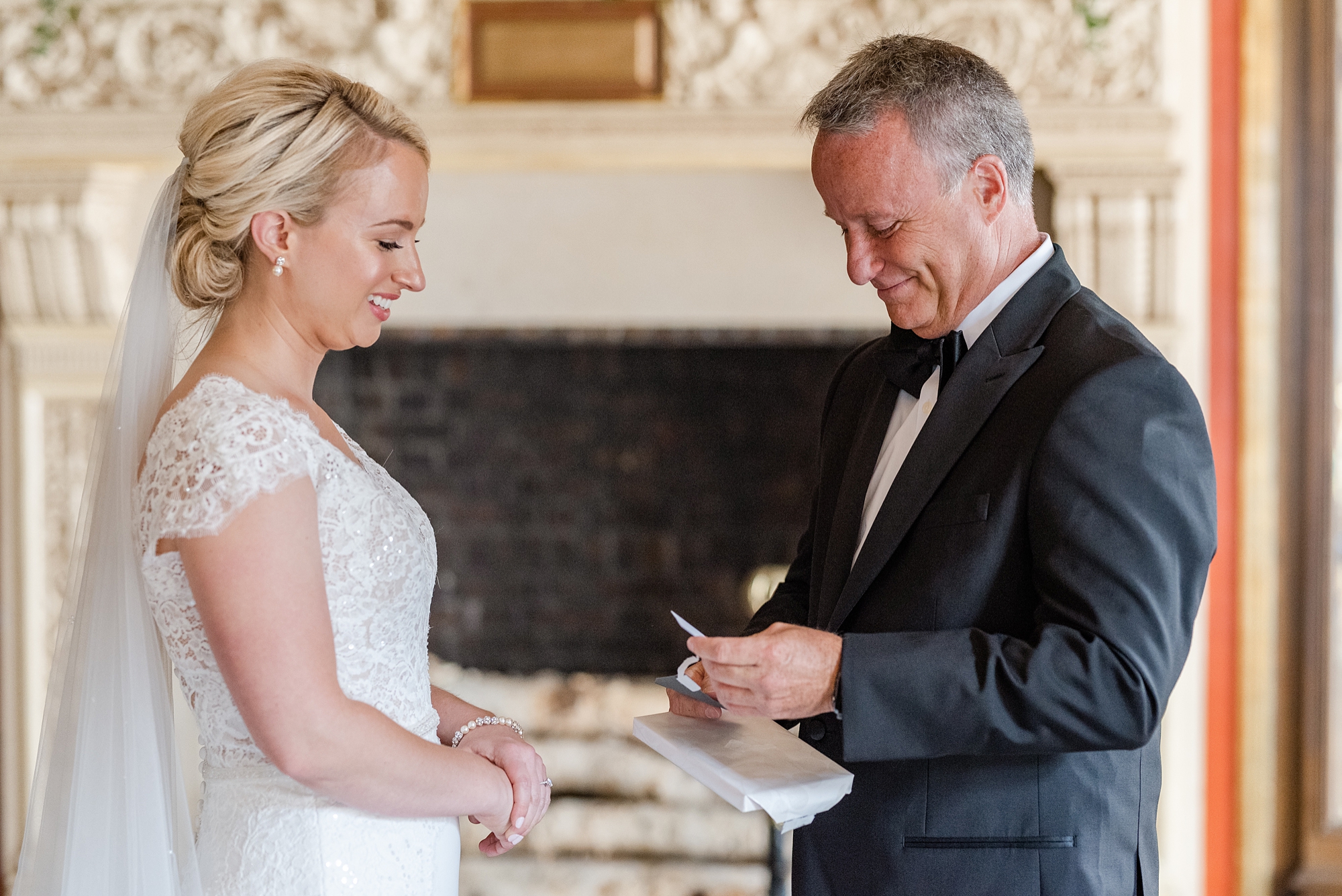 bride gives dad gift during first look